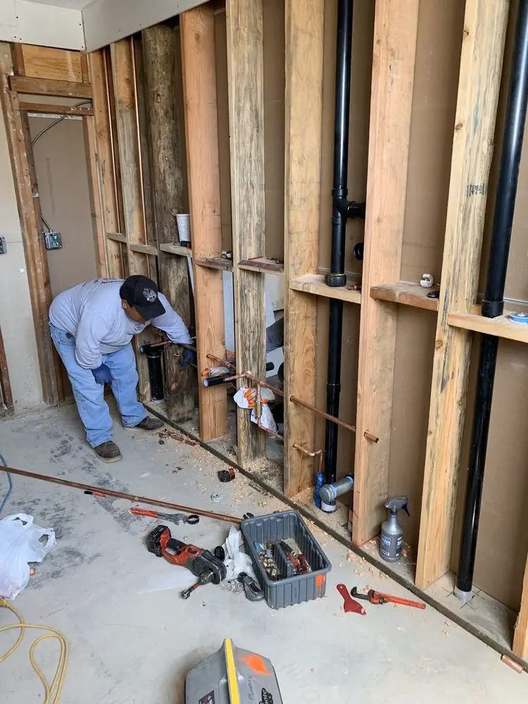 Commercial rough-in plumbing for Water Heater Replacement in Broadway